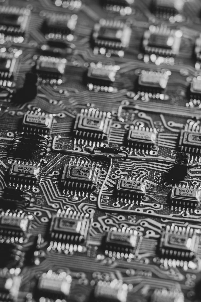Semiconductor chips representing the fab footprint behind AI