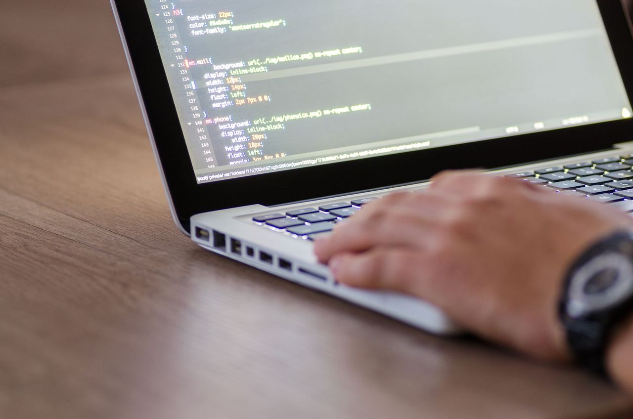 A laptop running a coding session - Gradio turns a Python script into a live UI in minutes.